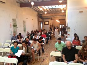 The crowd at 108 Starr Street. (Photo: Alexandra Glorioso)