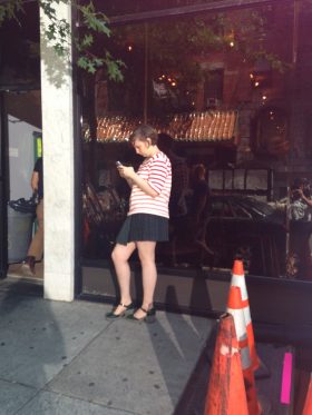 Lena Dunham doing some serious instagramming (Photo: Anna Silman)