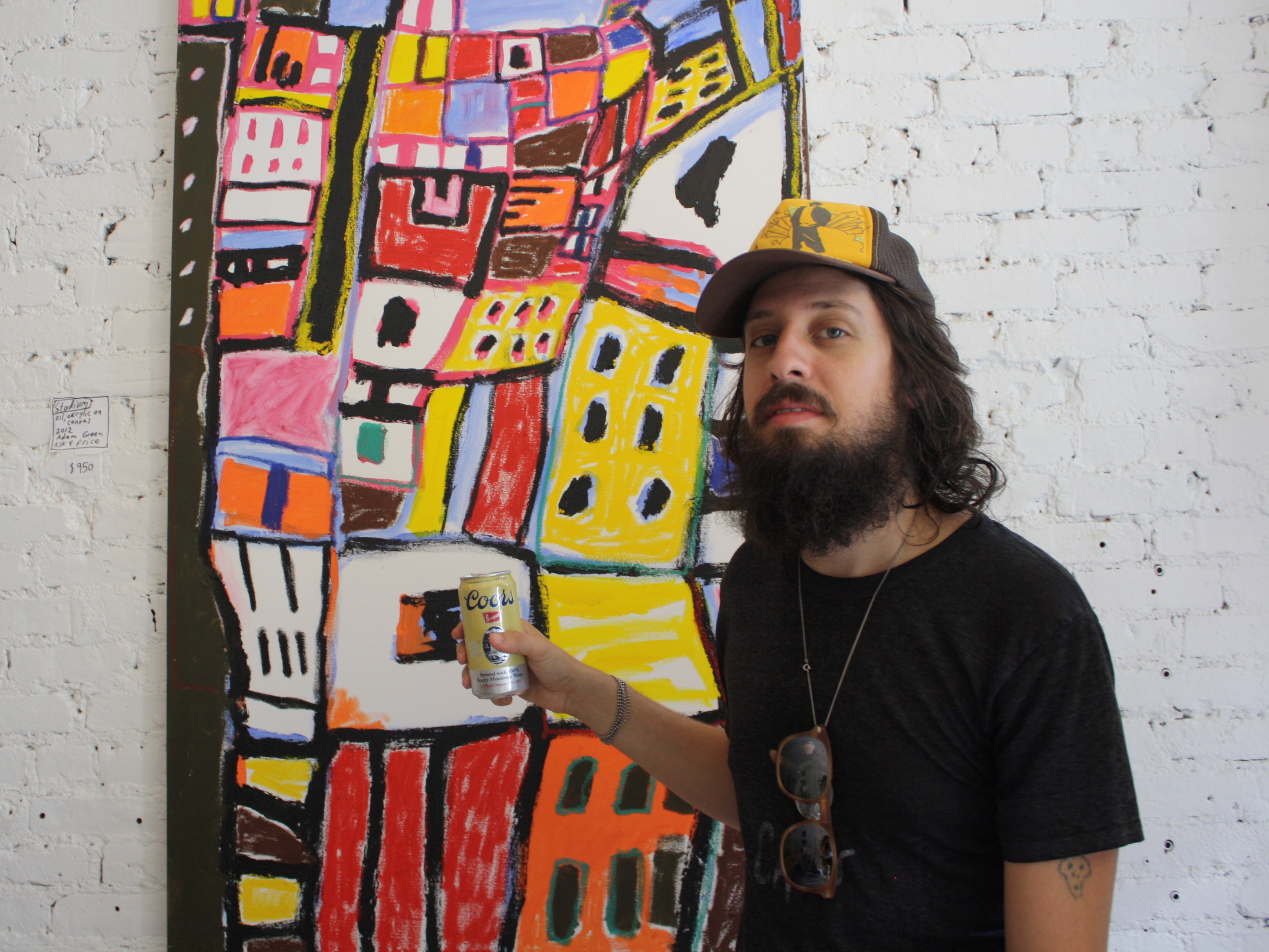 Adam Green in front of one of his paintings (Photo: Anna Silman)