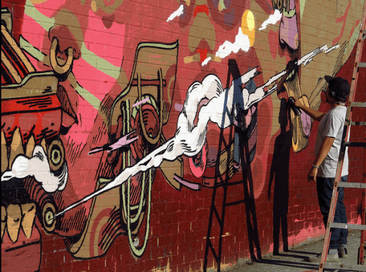 SMITHE at work at Vandervoort Place (Photo: Paula Villanueva for All City Canvas)