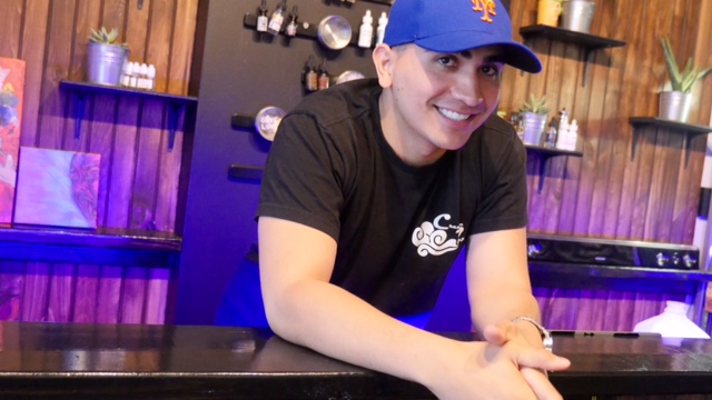 Creative Vape owner Wilfredo Ortiz behind the "juice" bar. (Photo: Karissa Gall)