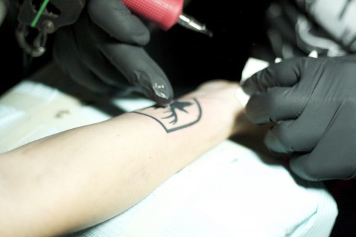 A fan got the logo tattooed on her arm. (Photo: Nikita Richardson)