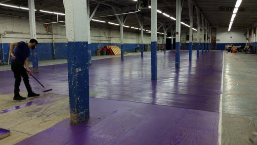 Volunteers prepare the space.