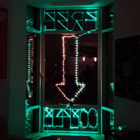 The free coffee sign from inside of the apartment. (Photo courtesy Alex Krutchkoff)