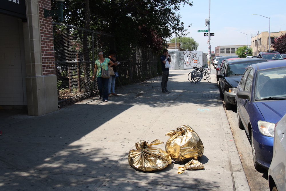 This Artist Goes Around Turning Trash Into Bags of Gold - Bedford